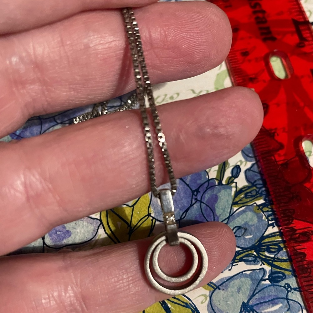Sterling silver necklace with diamond accent